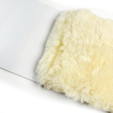 Rugpijn of rugklachten. Medische schapenleren rugwarmer