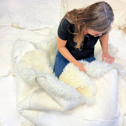 Genaaid vloerkleed van meerdere schapenvachten