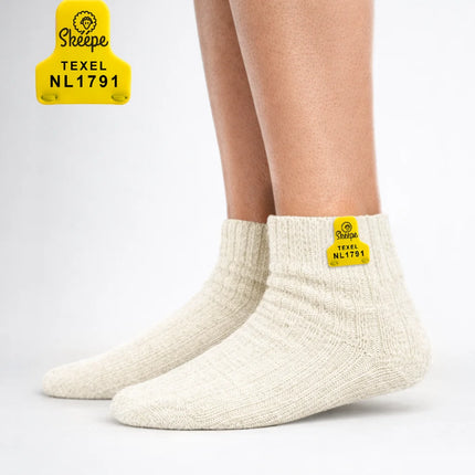 Witte wollen enkelsokken