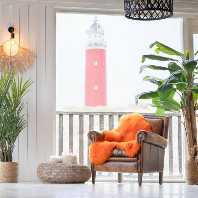 Donkeroranje schapenvacht kopen - Texelaar - oranje schapenvacht